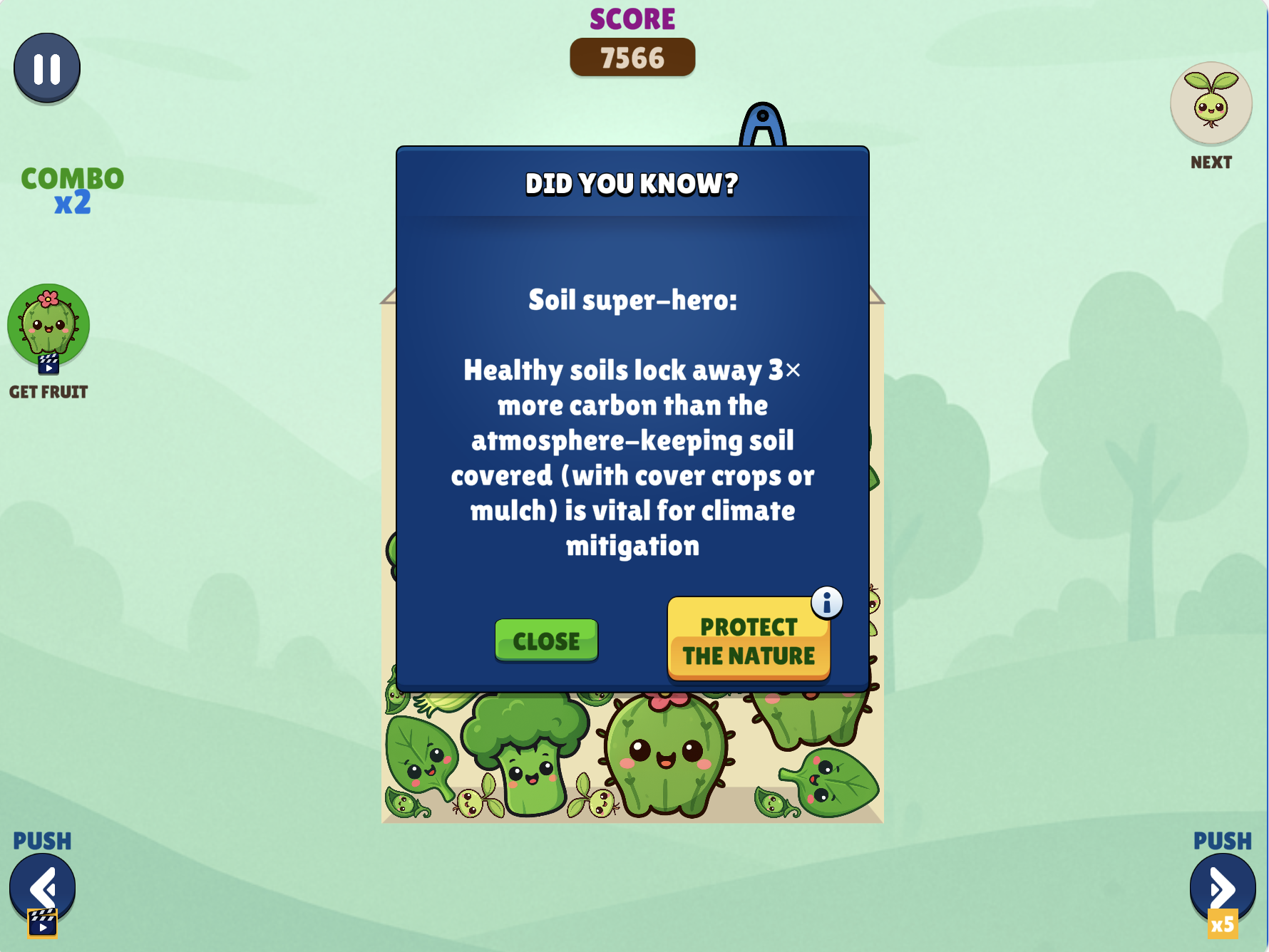 Watermelon Suika Game gameplay featuring a Green Game Jam edition with fact popup about soil and climate awareness