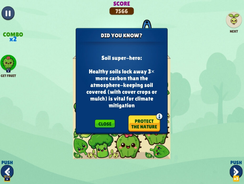 Watermelon Suika Game gameplay featuring a Green Game Jam edition with fact popup about soil and climate awareness